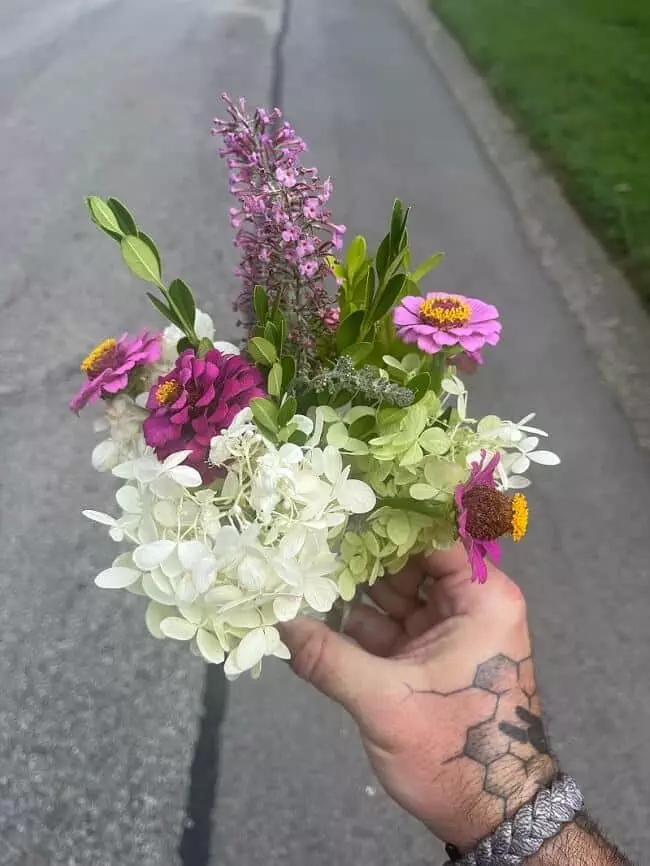 Beautiful little flower bouquet in hand